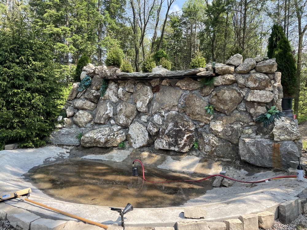 High pressure patio cleaning and fountain prep performed in Paris Ontario.